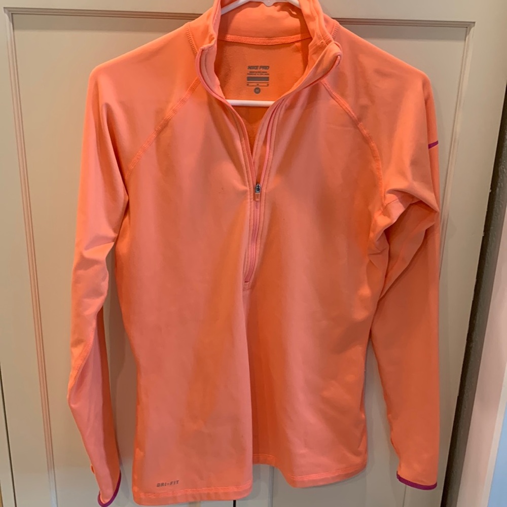 Women’s Nike half zipper running jacket.